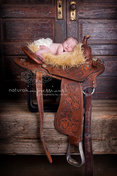 Newborn Baby on Saddle