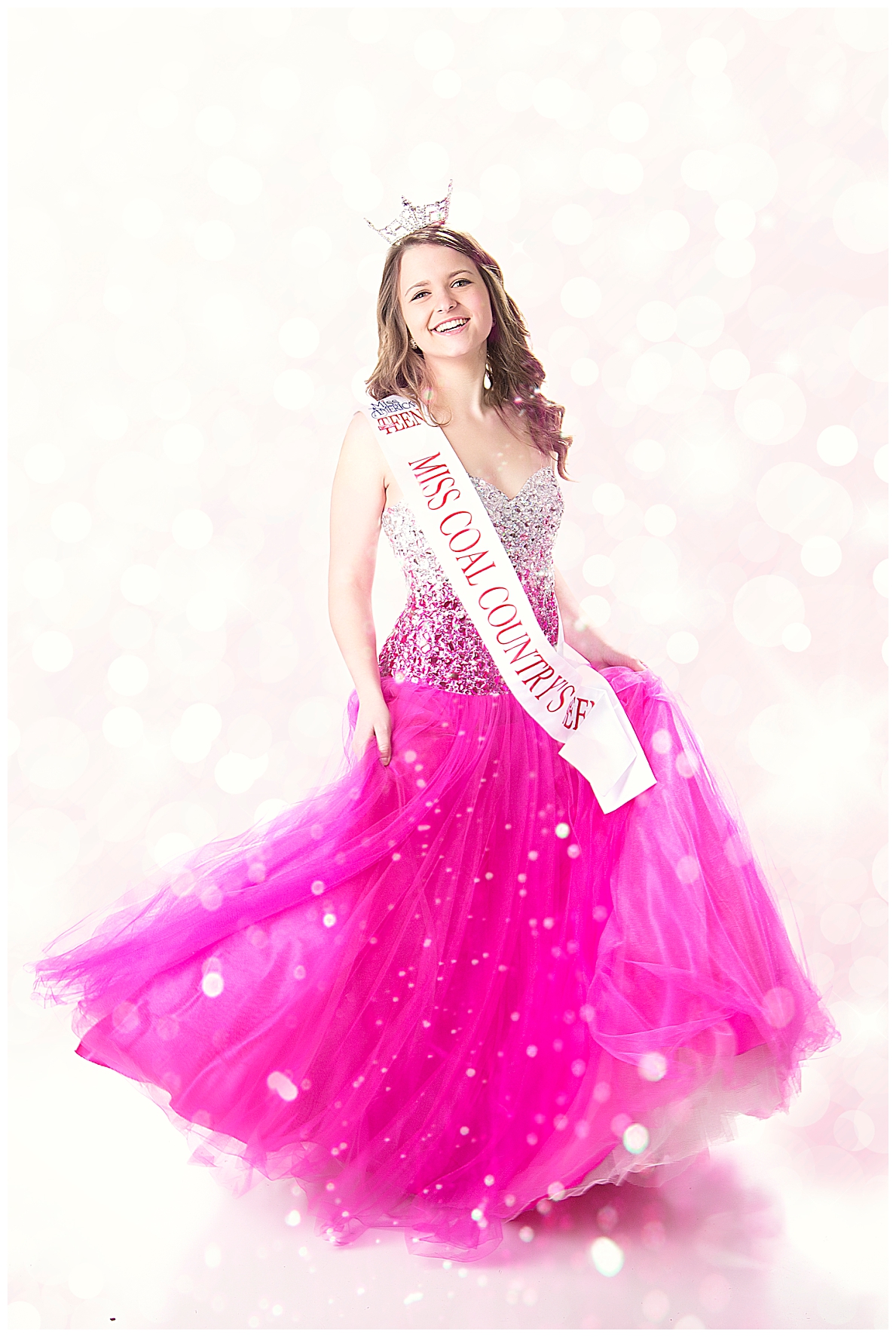 Teen girl in pink gown