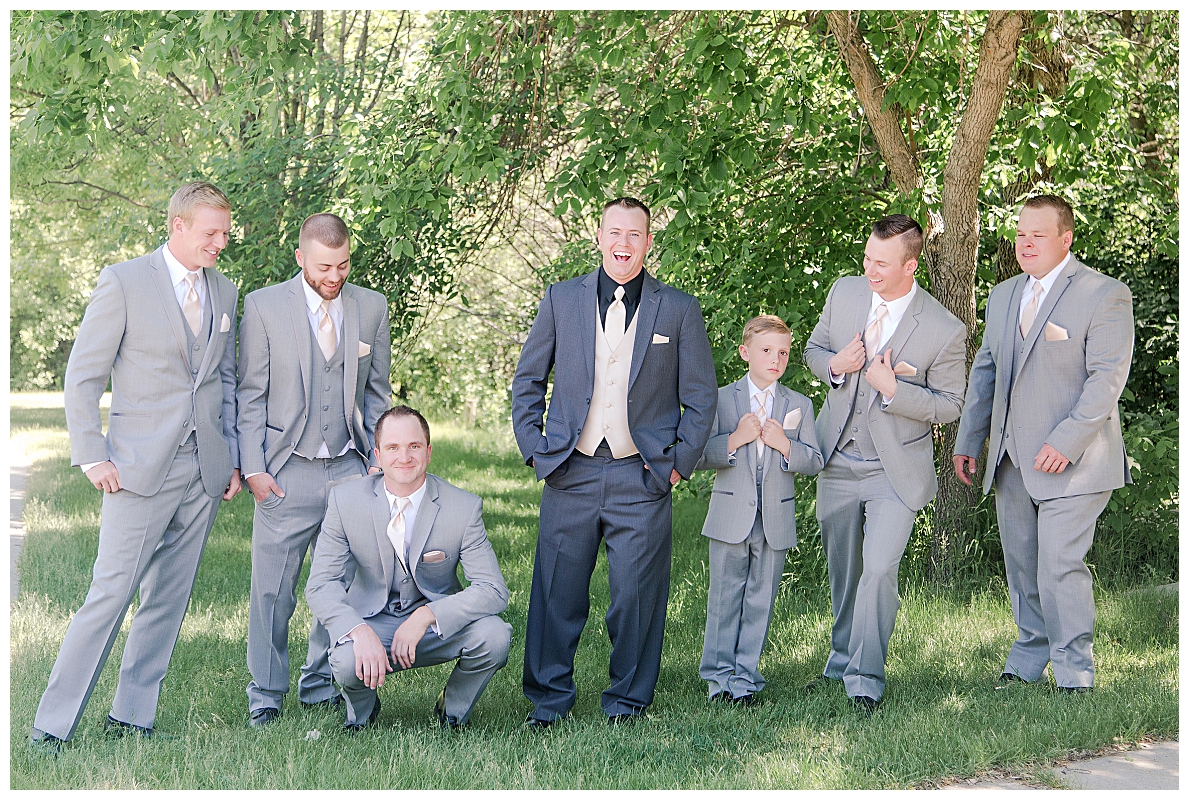 Grooms men laughing picturs