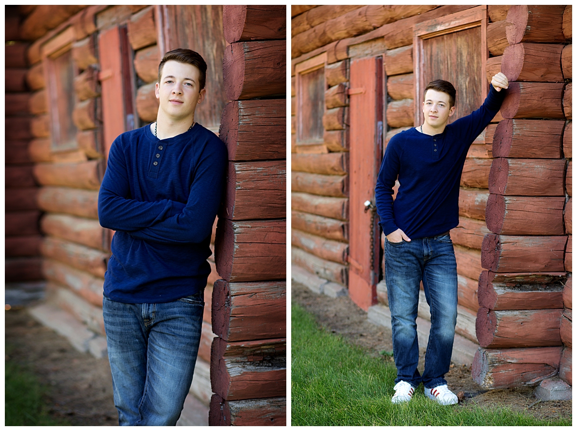 Senior pictures by old log cabin