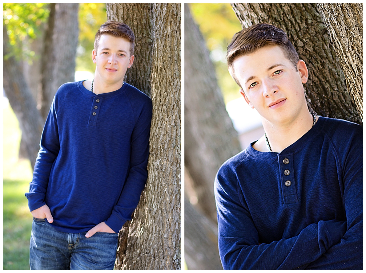 Senior boy with fall trees