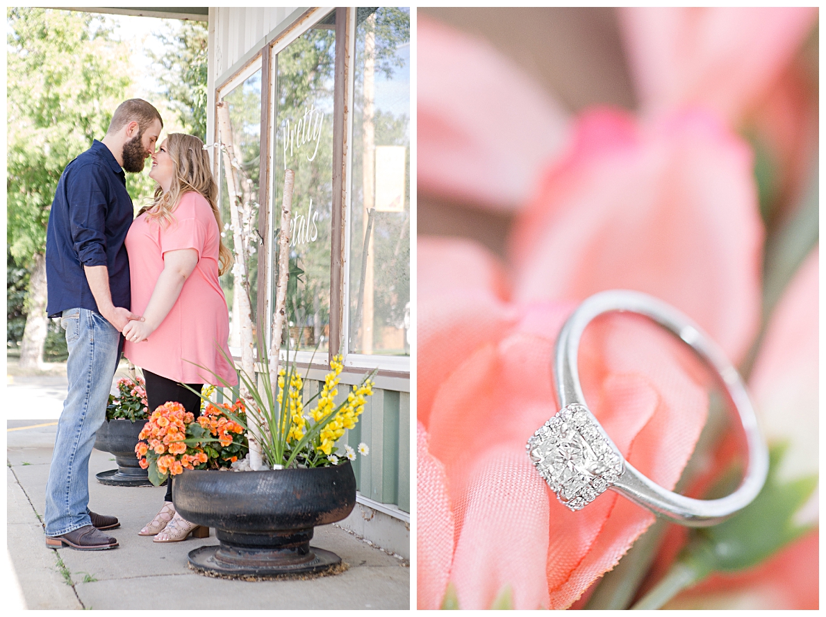 Engaged couple by flower shop