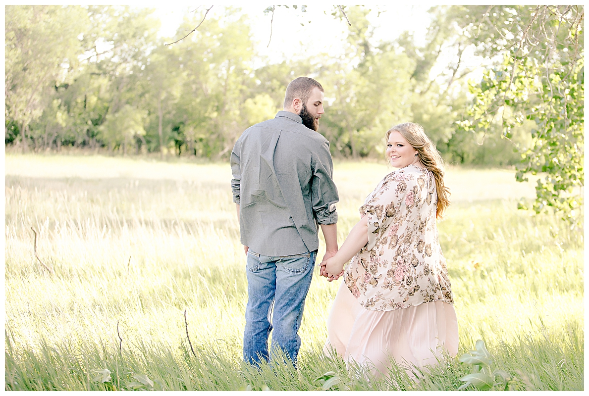 Engagement pictures in a field