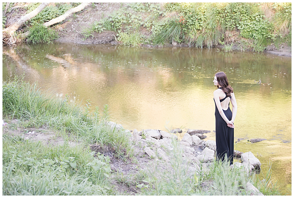 Panoramic senior picture by river