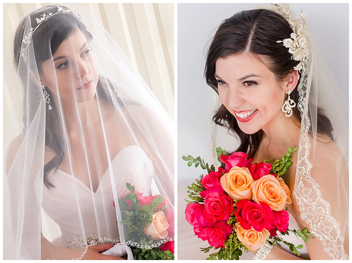 bride wearing simple busher over her face and more elaborate veil with wide lace edging and chandelier earrings