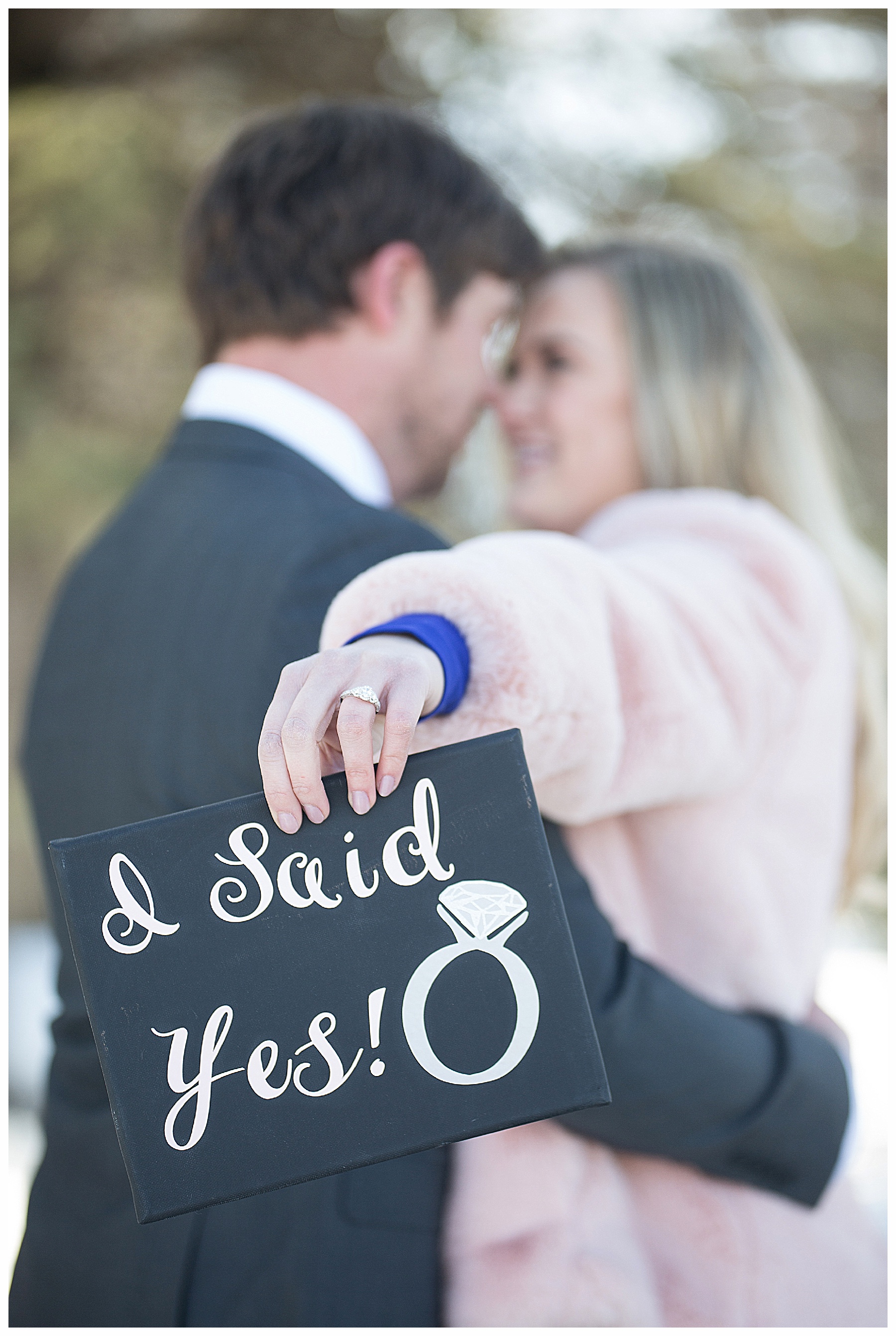 Cute sign engagement pictures