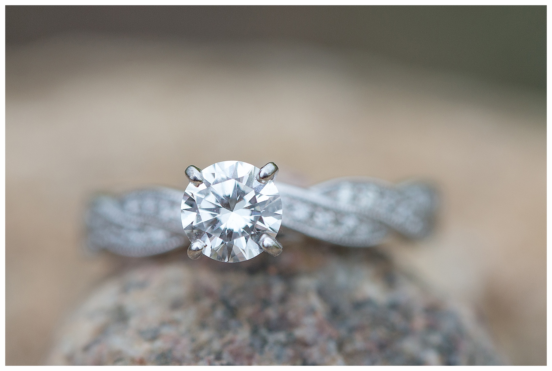 Engagement ring on a rock