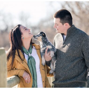 engaged couple with puppy