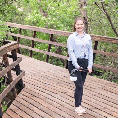 Photographer Assistant with flash on bridge