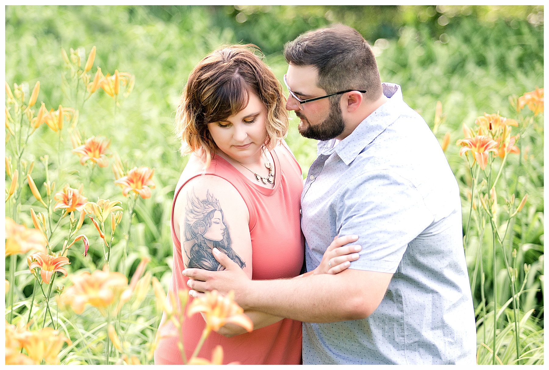 Engagement pictures at Dakota Sun Gardens by lilies