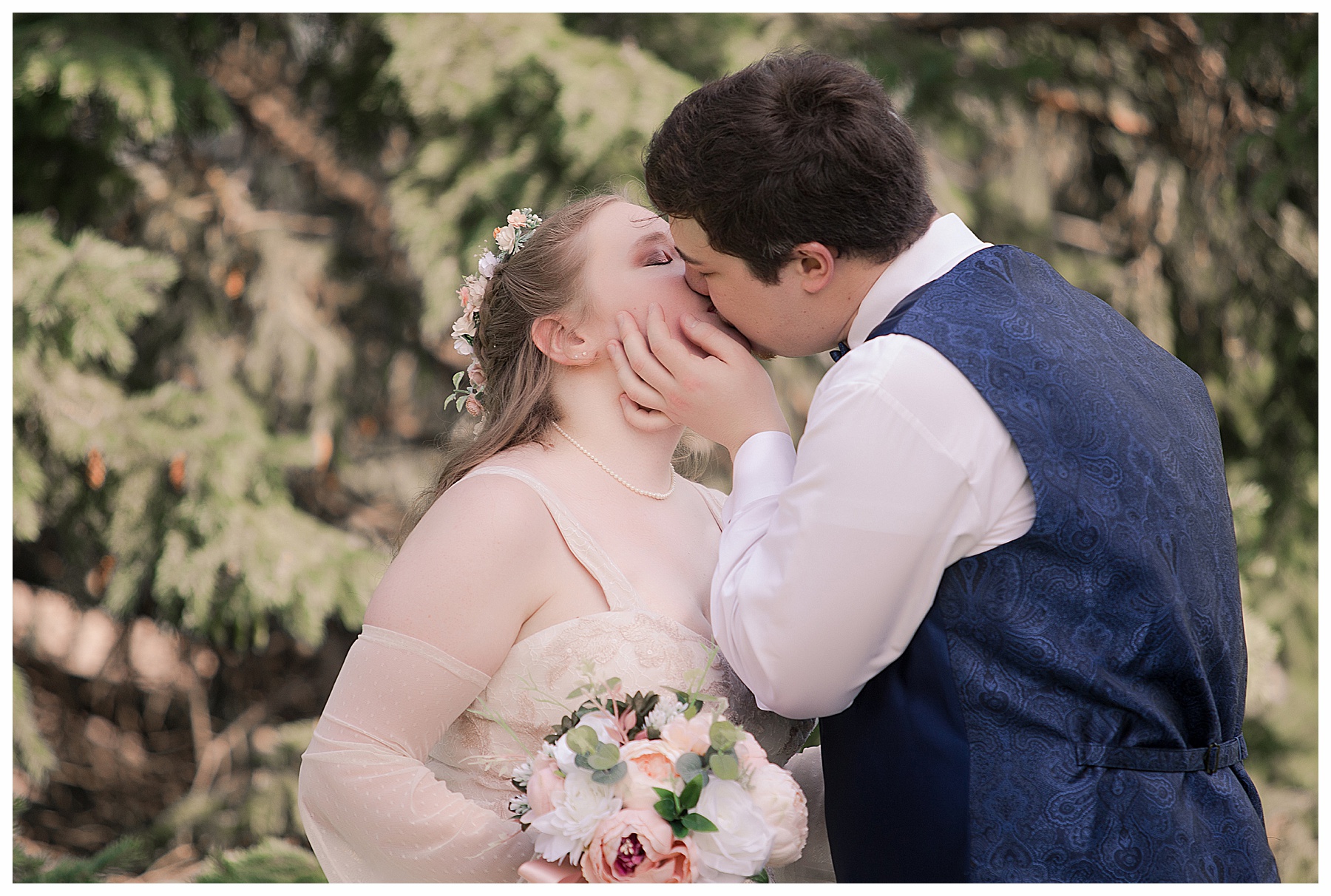 bride and groom first kiss