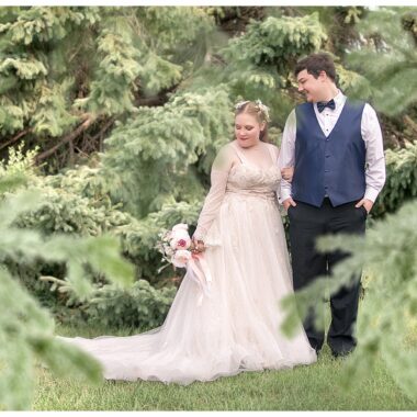 Bride and Groom in evergreen trees