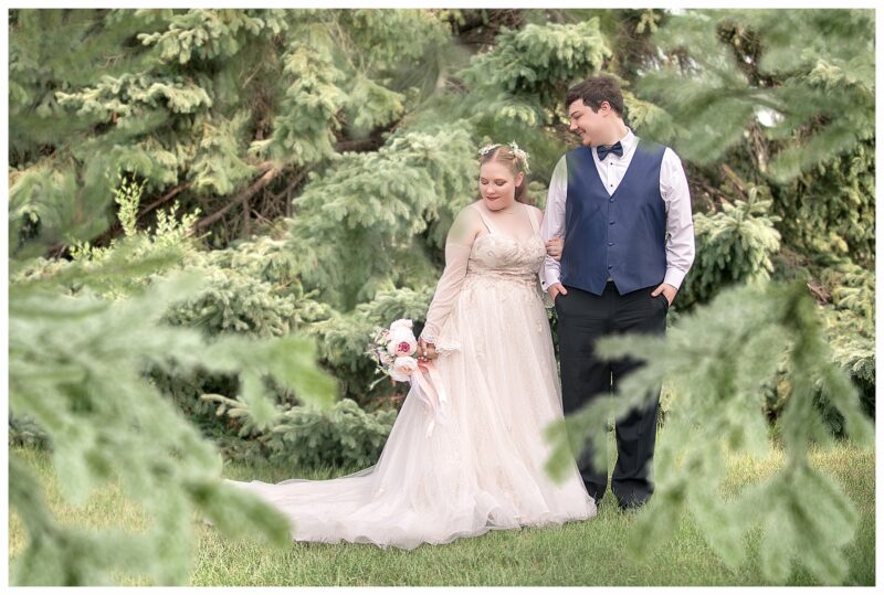 Bride and Groom in evergreen trees