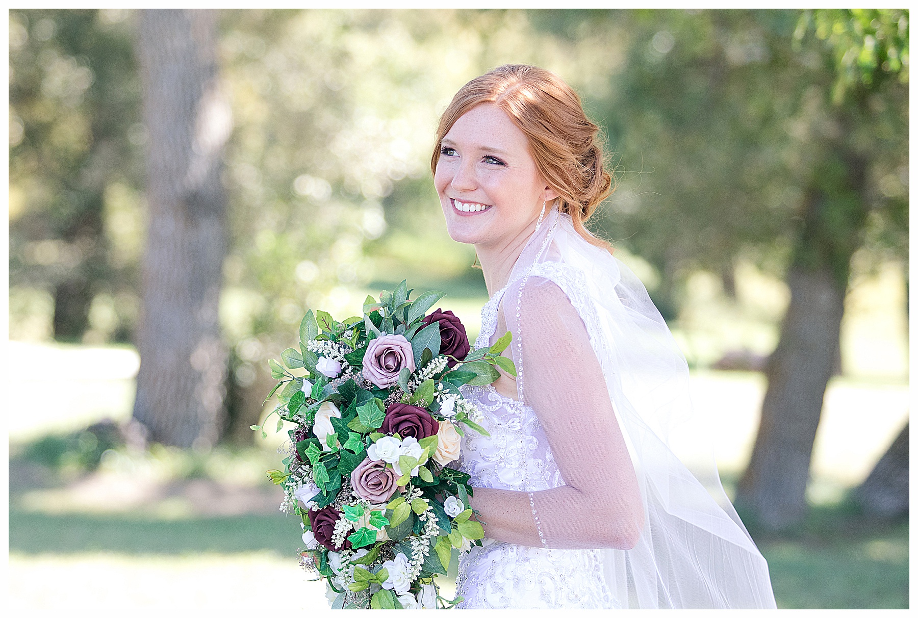 redhead bride and Burgundy and rose bouquet