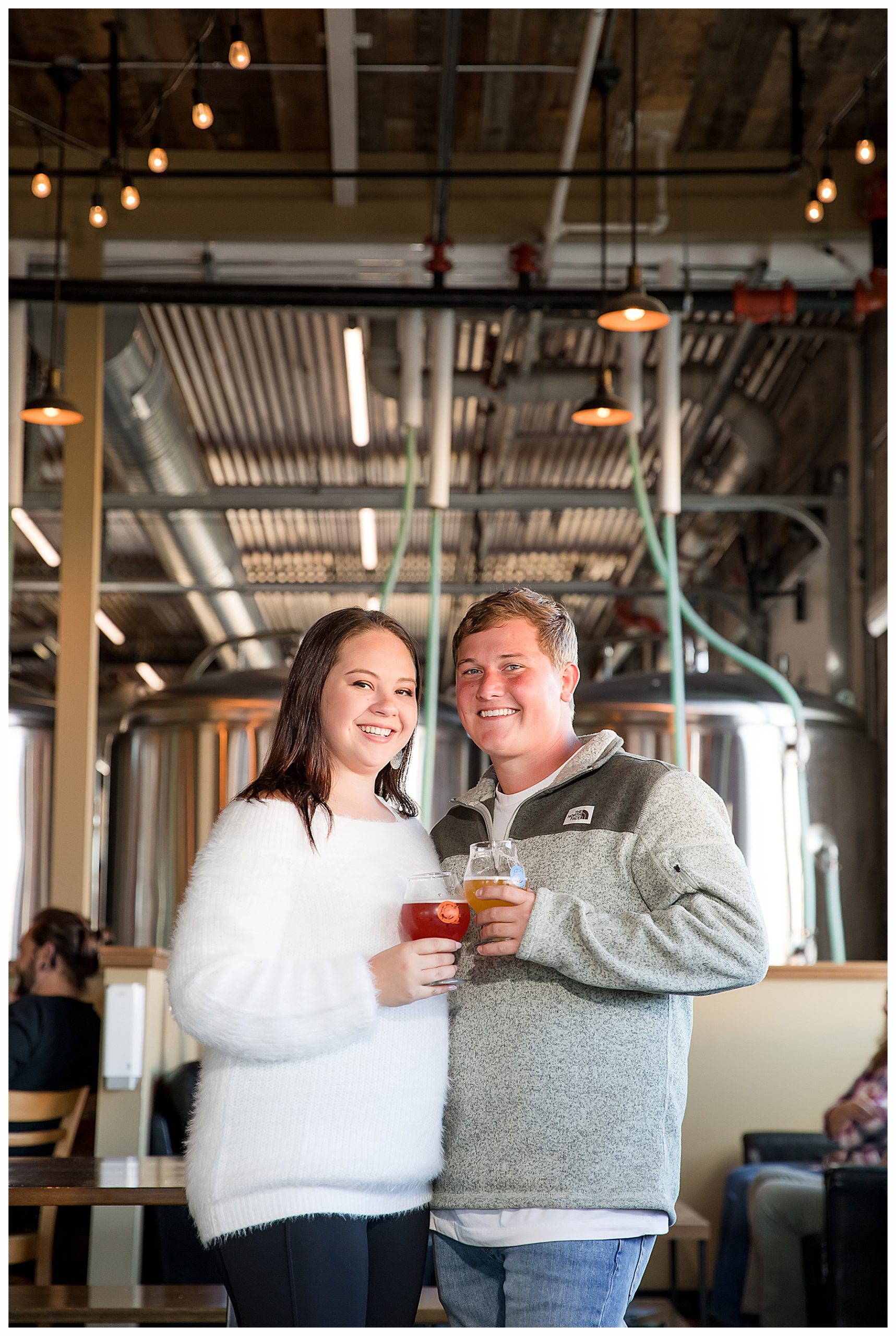 Couple toast at Laughing Sun Brewery in Bismack ND