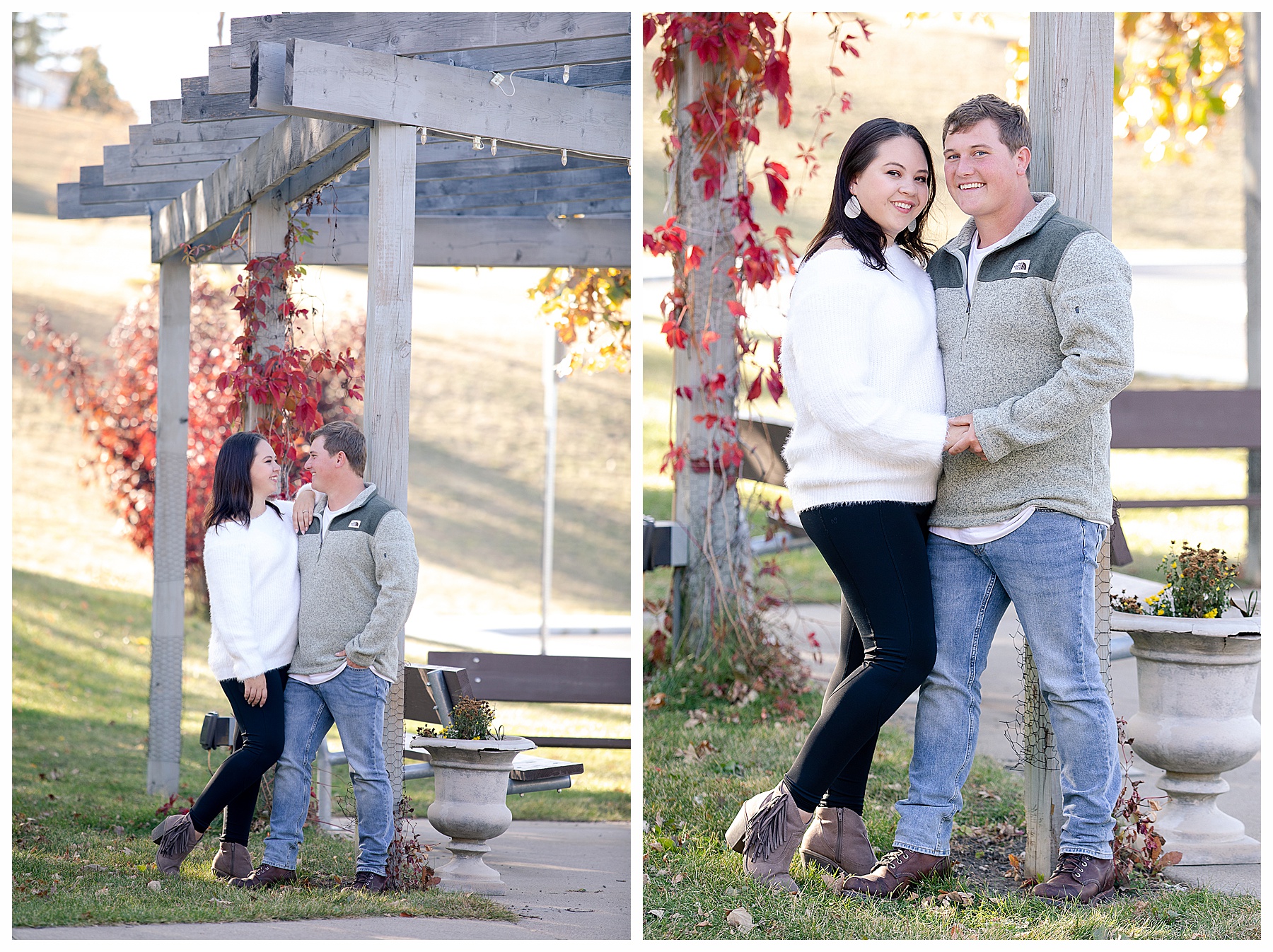 Couple look at each other under arbor and red fall trees