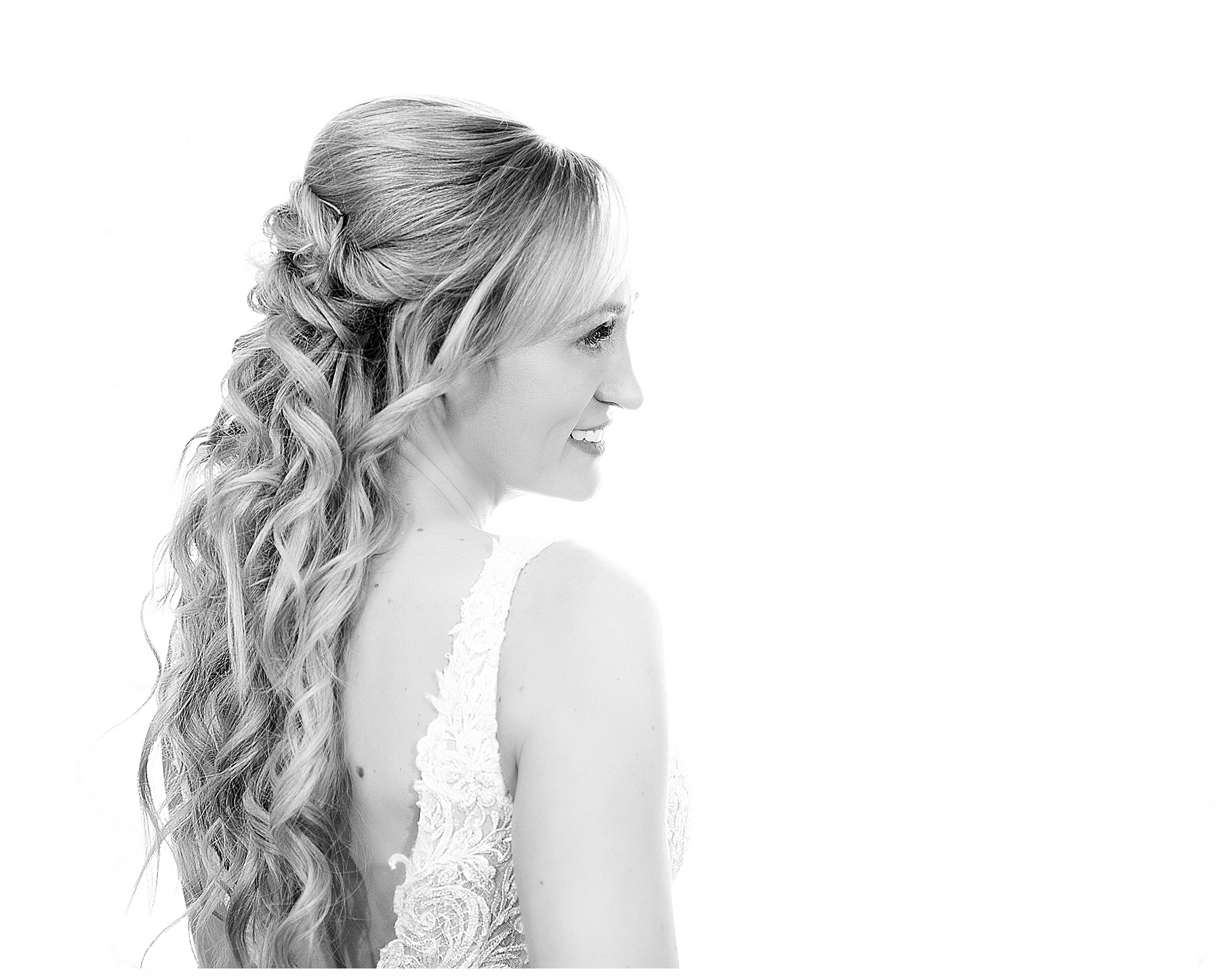 Black white photo of bride with long blond hair