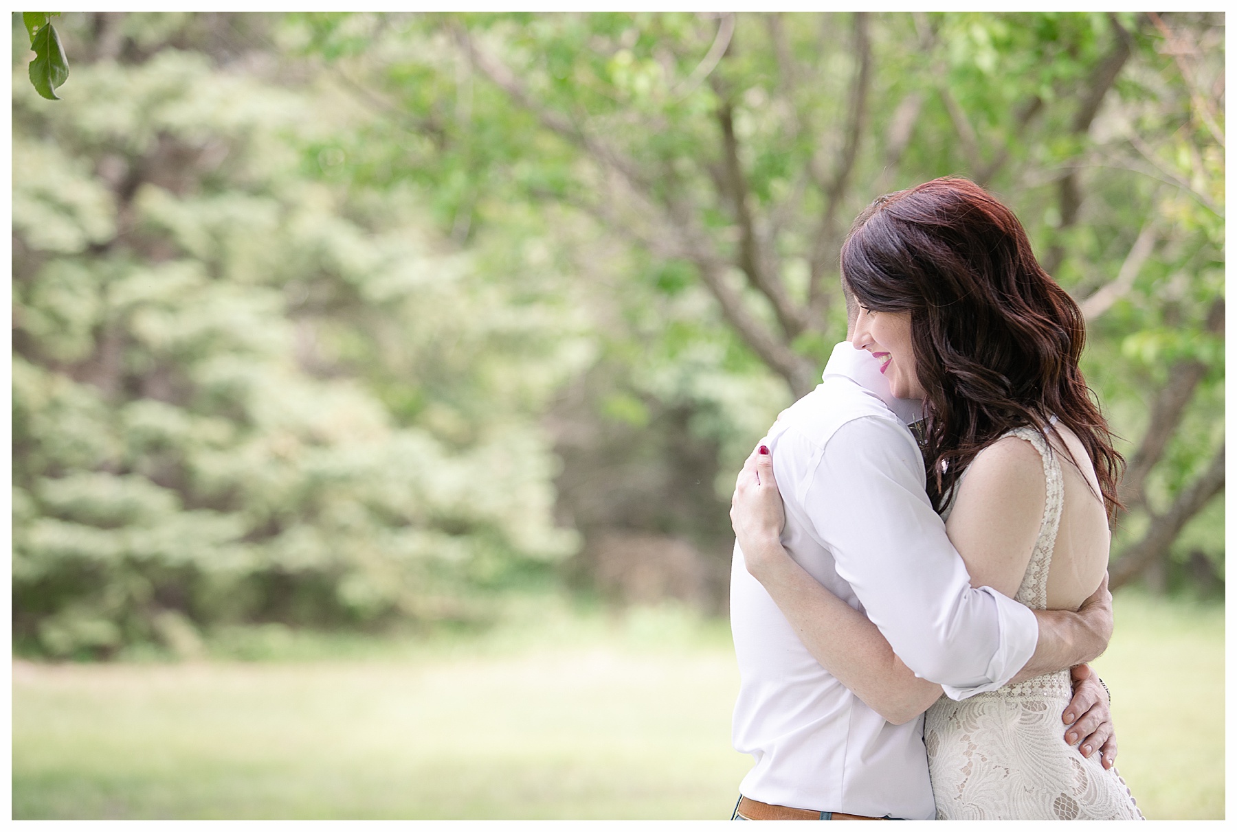 bride and groom hug during first look