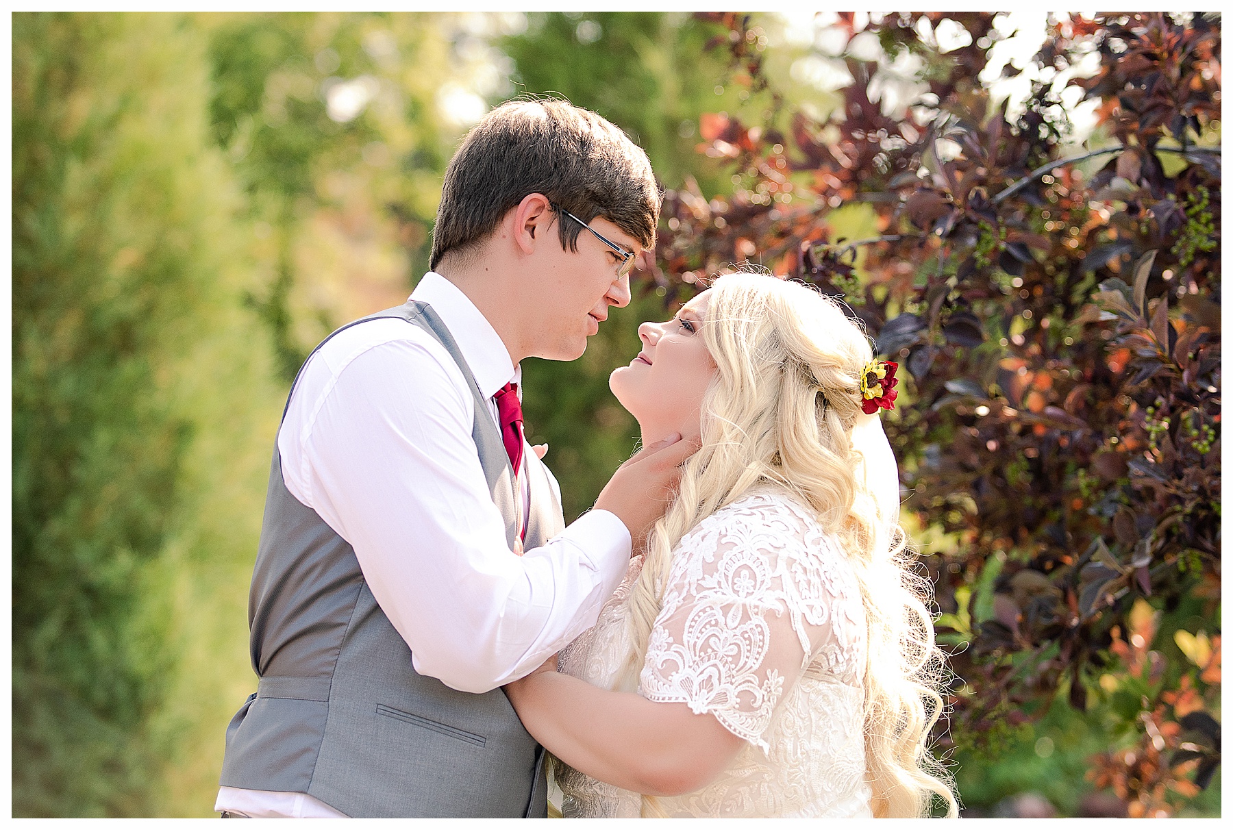 Bride and groom look at each other during outdoor wedding pictures.  Dickinson wedding photographer
