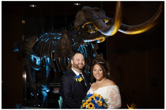 Bride and Groom at Bismarck Heritage center photo with mamoth