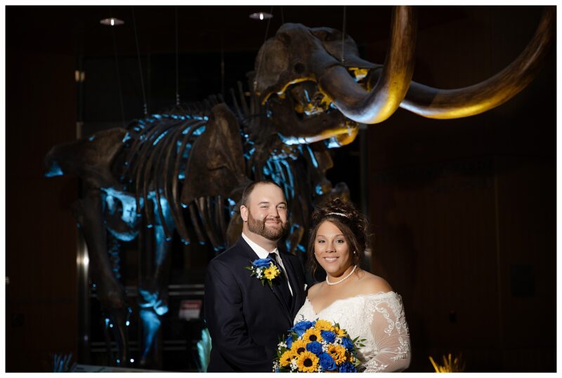 Bride and Groom at Bismarck Heritage center photo with mamoth